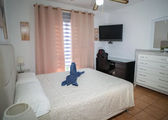 Bonita Con Piscina Privada * كوراليهو